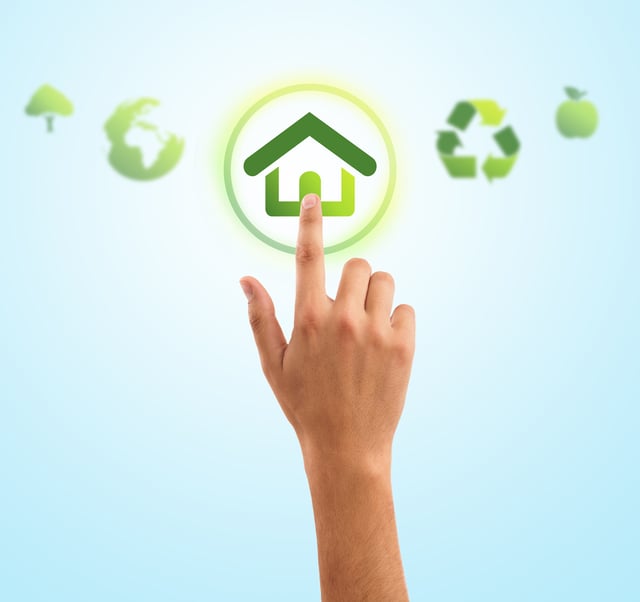 hand choosing home symbol from eco green icons, gradient background